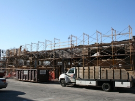 Construction at the former Prospect Mall as the auto dealership turned mall is being converted to a mixed-use apartment building.