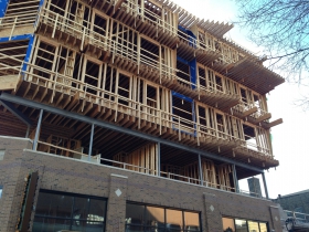 Prospect Mall Apartments soars over the East Side.