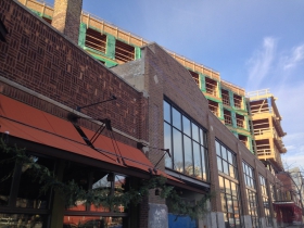 A view of Prospect Mall Apartments rising above Collectivo.