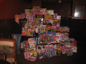 Germaine Bowers with Christmas Gifts for Journey House Kids.