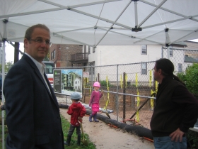 Mike O'Connor [l] and Christopher Adams [r], principals of Dominion Properties instruct their crew as to their responsibilities.