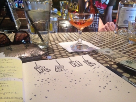 Notebook and cocktail. Photo by Kristina Rolander.