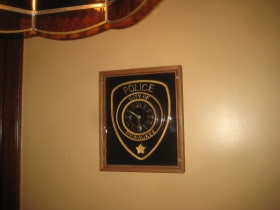 Clock fashioned from a Milwaukee Police Department emblem