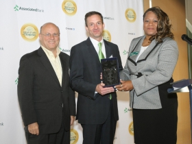 NeighborWorks America President and CEO Paul Weech, Associated Bank Executive Vice President and Chief Marketing Officer Christopher Piotrowski, and Housing Resources, Inc. Executive Director Trena Bond at the Housing Resources, Inc. “Breakfast with Champions” event
