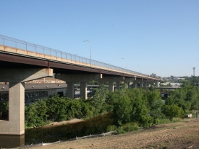 A road bridges across the park.