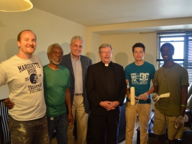 Jake Murray, Cornelius Jynes, Ald. Bob Bauman, Fr. Warren Sazama, S.J., Jonathan Medina, and Nana Yorke