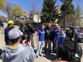 Braun Taking Photos with Volunteers