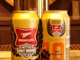 The cans carrying the two logos that they signed at the press conference