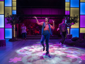 Milwaukee Repertory Theater presents As You Like It in the Quadracci Powerhouse February 15 – March 20, 2022. Pictured Center: Savannah L. Jackson. Background, L-R: Nancy Voigts and Adam Wesley Brown