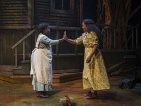 Zonya Love (Celie) and Stephanie Umoh (Nettie) in Milwaukee Repertory Theater’s 2014/15 Quadracci Powerhouse production of The Color Purple.