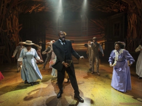 Carl Clemons Hopkins (center) and cast shown in Milwaukee Repertory Theater’s 2014/15 Quadracci Powerhouse production of The Color Purple.