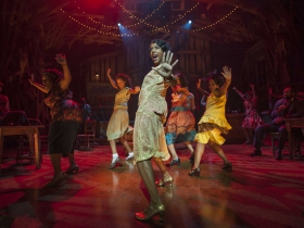 Christina Acosta Robinson as Shug Avery (center) and cast in Milwaukee Repertory Theater’s 2014/15 Quadracci Powerhouse production of The Color Purple.