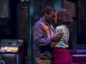 Sterling (Chiké Johnson) and Risa (Malkia Stampley) in Milwaukee Repertory Theater’s production of August Wilson’s Two Trains Running April 16 – May 12, 2019