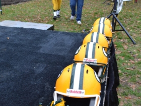 Packer helmets dramatically framed the scene