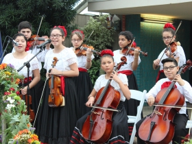 The Latino Arts Strings Program performing at the Domes Grand Reopening, December 1, 2016