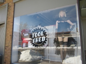 The Tool Shed’s window maniquin, “Gracie,” sported wigs and cycling gear across the street at Cory the Bike Fixer before it was passed on, Laura Stuart said.