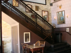 Stairway leading to the second level of Hotel Foster.