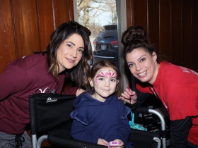 Erin Theriault, MCW Cardiovascular Center with daughter Nora and Katie Raebel from Katie Paints Faces
