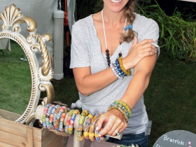 Leslie Winkelman, owner of Wear A Story, that features recycled glass bottles and brass bangels made into hand painted small jewelry designed from Ghana