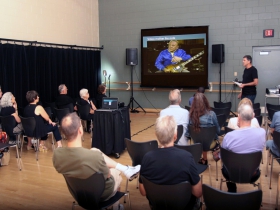Brad Smith spoke about Les Paul's  innovative talents and unique playing style which included, licks, trills, chords and fretting