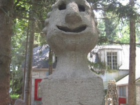 Sculpture guarding the property.