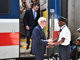 Tony Evers Greets Amtrak Conductor