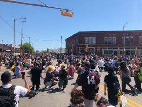 Kneeling on Mitchell St.