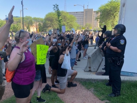 Hands Up in Front of Officers