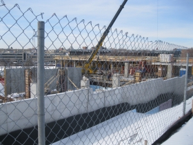 Looking through the construction fence.