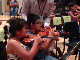 Tony working with Progressions students in a rehearsal.