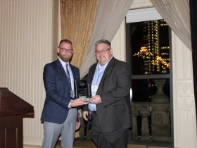 (l-r) Josh Brown, Milwaukee NARI President, presented the Building Milwaukee award to Andy Hepburn, Chief Innovation Officer, of GPS Education Partners.