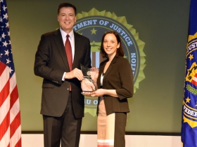 James Comey and Katie Sanders