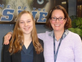 Reagan teacher Margaret Holtgreive with student Julia Brunson.
