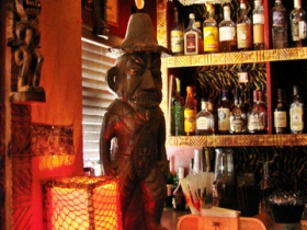 Front bar featuring tiki statue.