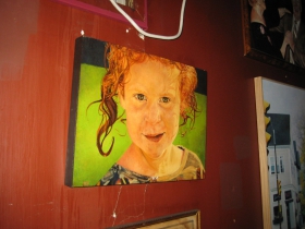 Not many taverns have childhood paintings of their bartenders hanging on the wall, but here is Mary by Mike Fredrickson.