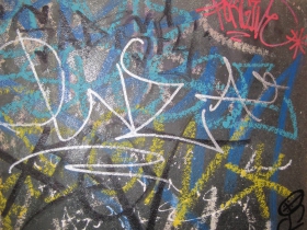 Graffiti on the window in the unisex bathroom. Very Riverwest.