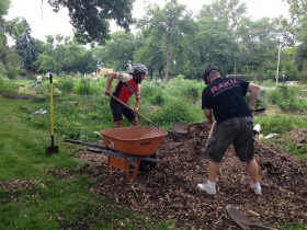 Filling up the wheelbarrow.
