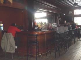 Martha behind the bar at the Uptowner