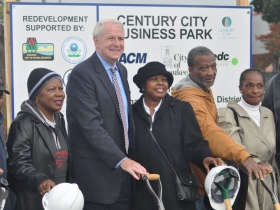Mayor Barret with members of the Triangle Neighborhood Association.  Yvonne McCaskill, in black hat standing to the left of the mayor.