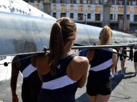 Lincoln Park Junior Womens Team Carries Their Scull to the Milwaukee River