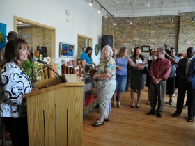 Charlotte John-Gomez speaking to the crowd.