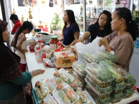 Toy Schuelke (right) at Asian International Market