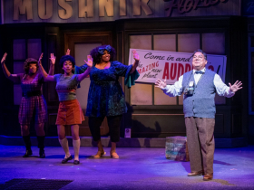 (l. to r.) Brandite Reed (Crystal), Kristen Jeter (Chiffon), Raven Dockery (Ronnette) and David Flores (Mushnik) in Skylight Music Theatre’s production of Little Shop of Horrors running November 19, 2021 - January 2, 2022.