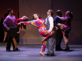(l. to r.) Janet Metz (Vicki Nichols), Zach Thomas Woods (Harold Nichols) and the cast of Skylight Music Theatre’s production of The Full Monty running September 24 – October 17, 2021.
