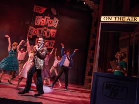 Doug Clemons (Corny Collins, front, left) with the Nicest Kids in Town while Samantha Sostarich (Velma Von Tussle, Right) watches during rehearsal of Skylight Music Theatre’s production of Hairspray November 16 – December 30.