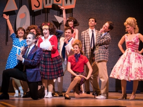 Doug Clemons (Corny Collins, front, left) with the Nicest Kids in Town in rehearsal for Skylight Music Theatre’s production of Hairspray November 16 – December 30.