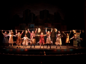 Eloise Field, center (Annie in LIGHT cast) performs with the LIGHT cast of Annie in rehearsal for Skylight Music Theatre’s production of Annie running November 17 through December 27.