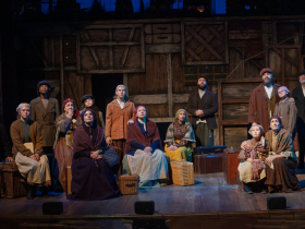 Andrew Varela (Tevye), Janet Metz (Golde), and company in Skylight Music Theatre’s production of Fiddler on the Roof running October 3-26, 2025.
