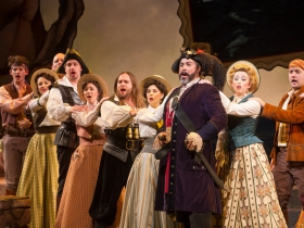 Andrew Varela (Pirate King), center, and Cast of Pirates of Penzance