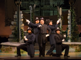 Martin Lowen Poock (Sergeant of Police), center, and Cast of Pirates of Penzance